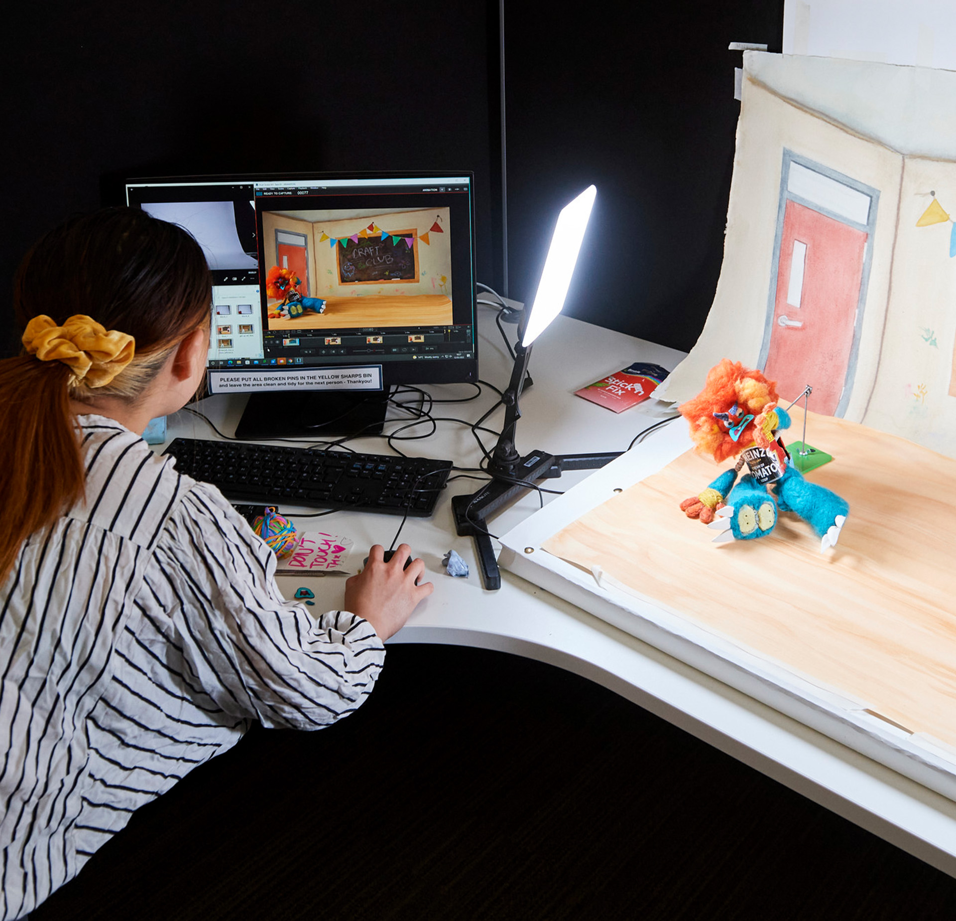 Stop motion animation student working in the studio