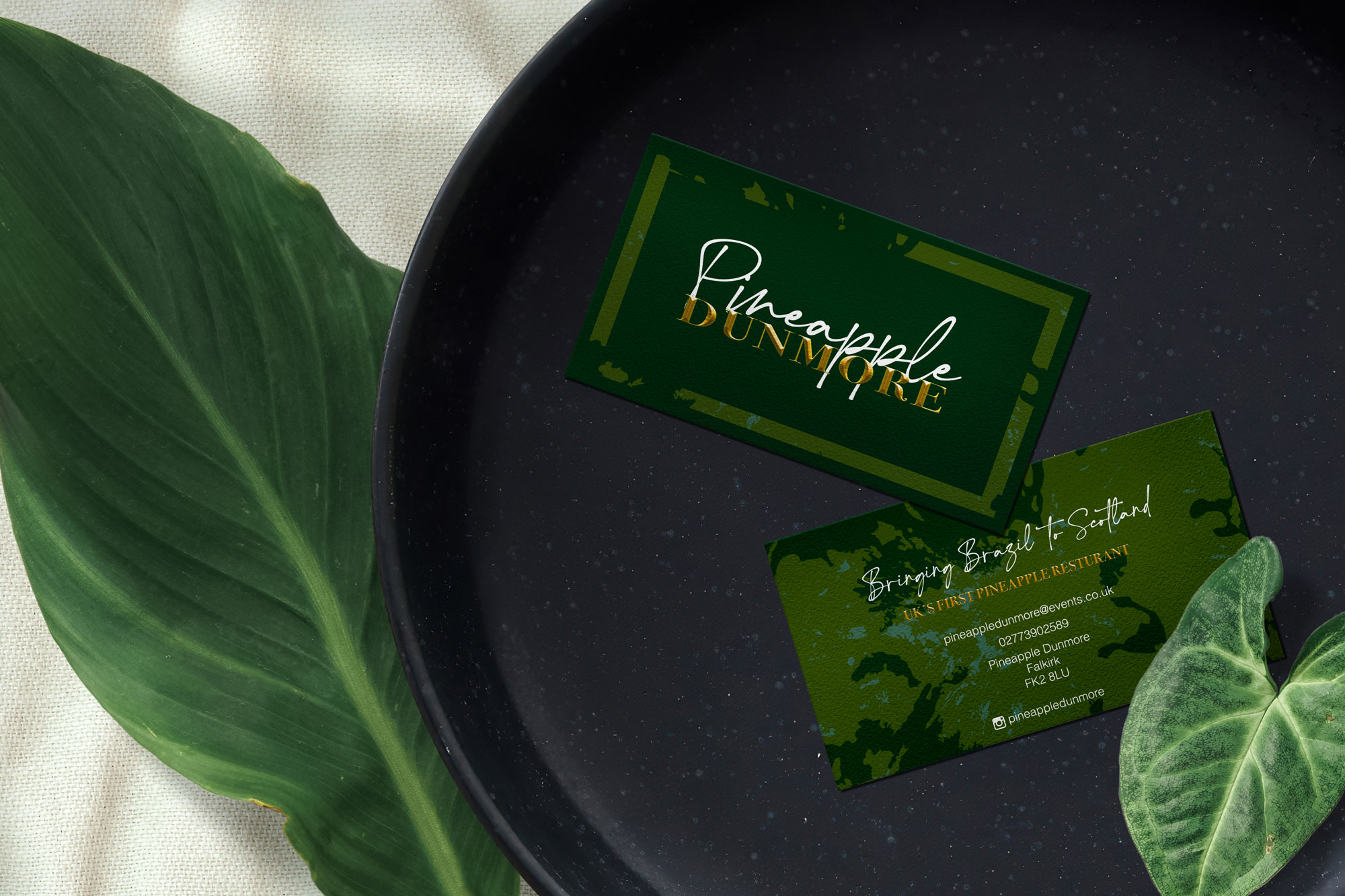 BA (Hons) Graphic Communication work by Chloe Bradbrook showing "Pineapple Dunmore" restaurant identity, business card coloured green with botanical decoration