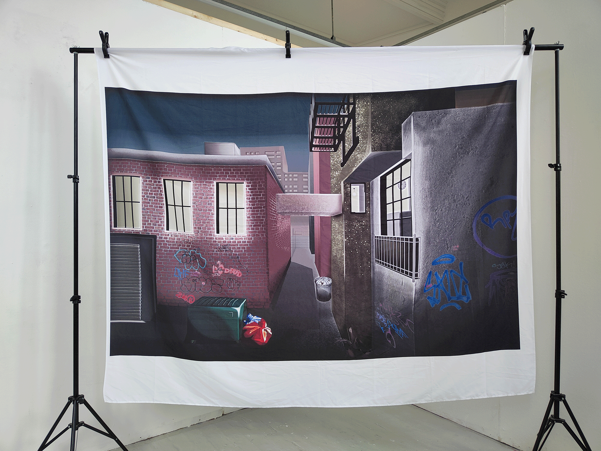 A digital painting printed onto a tapestry, showing a desolate urban alleyway. Trash litters the space and radiant light emanates from the nearby buildings windows.