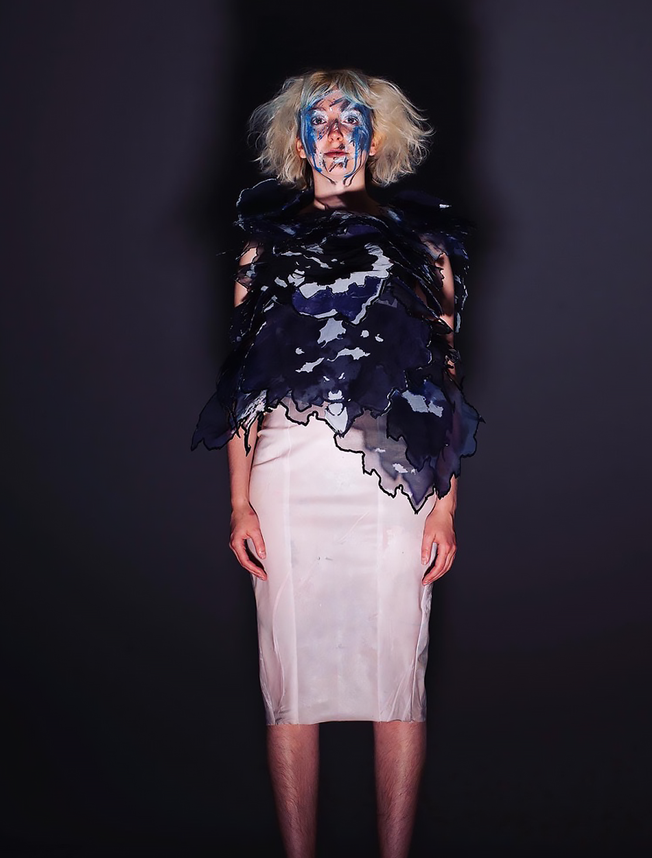 'BA Fashion Design work by Grace Bridges inspired by depression: showing a skintight "skin fabric" dress adorned in 70+ dyed abstract panels that cover the top portion of the dress.'