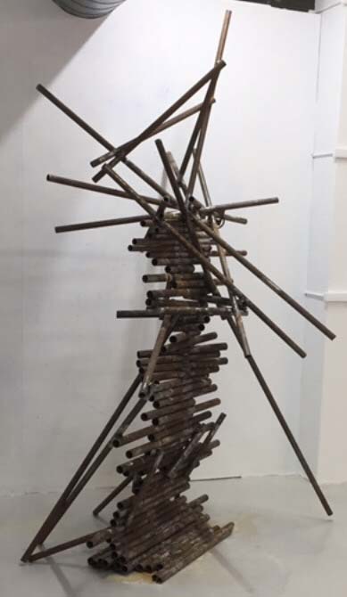 Graduate Fine Art work by Jo Thomasina, showing a 3D abstract tree, 30mm rusty steel pipes, welded together using a Mig Welder. Pipes of varied lengths and sizes