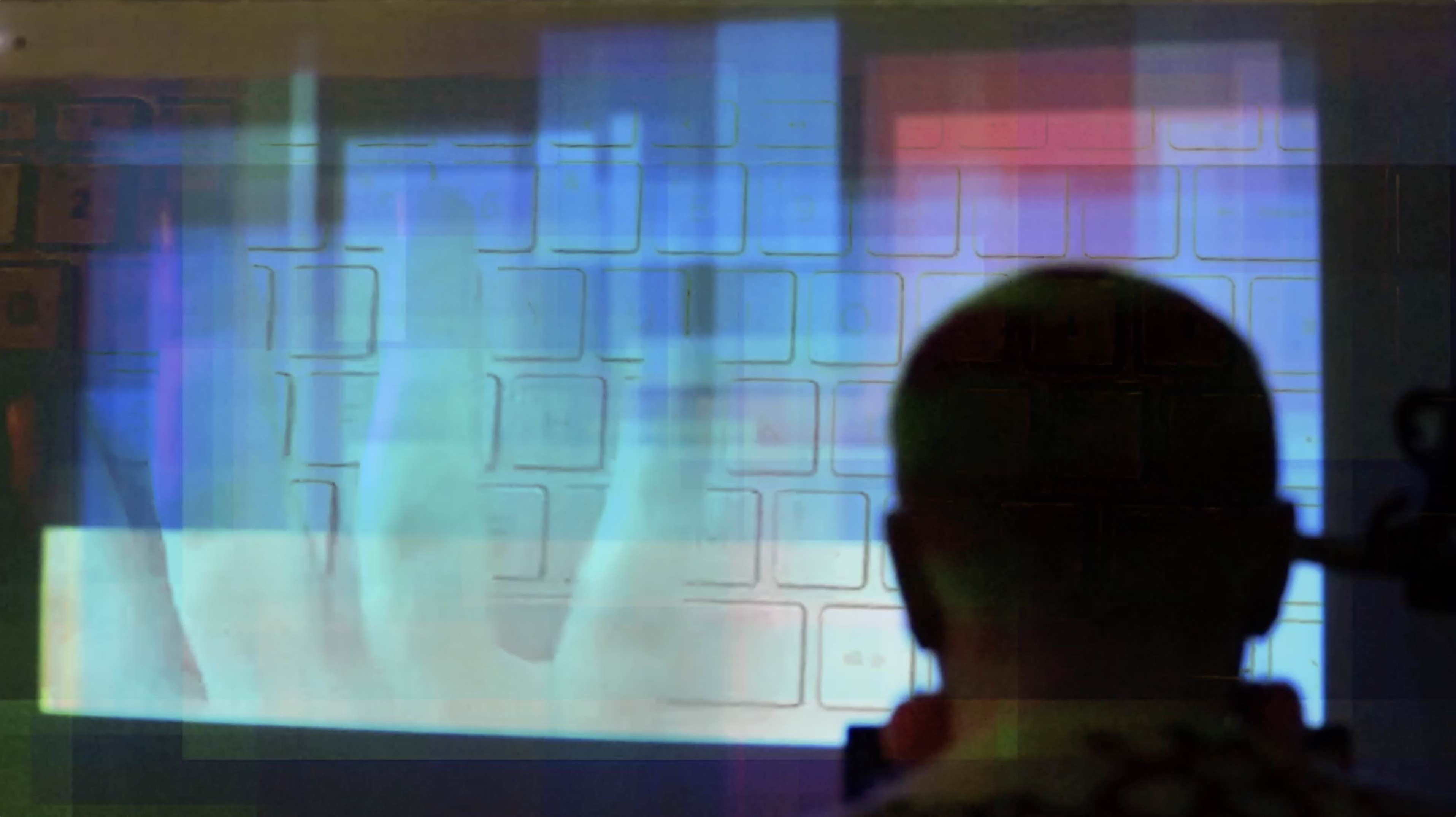 BA Fine Art video by weewaawoowee showing layered footage of coding and film.