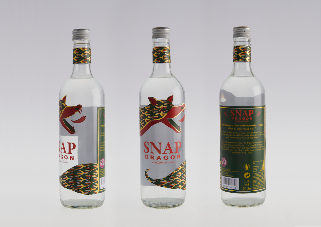 BA Graphic Design work by Rose Taylor-Townshend showcasing a chilli-infused vodka bottle with a snap dragon label hugging the bottle. The logo sits between the dragons head and tail.