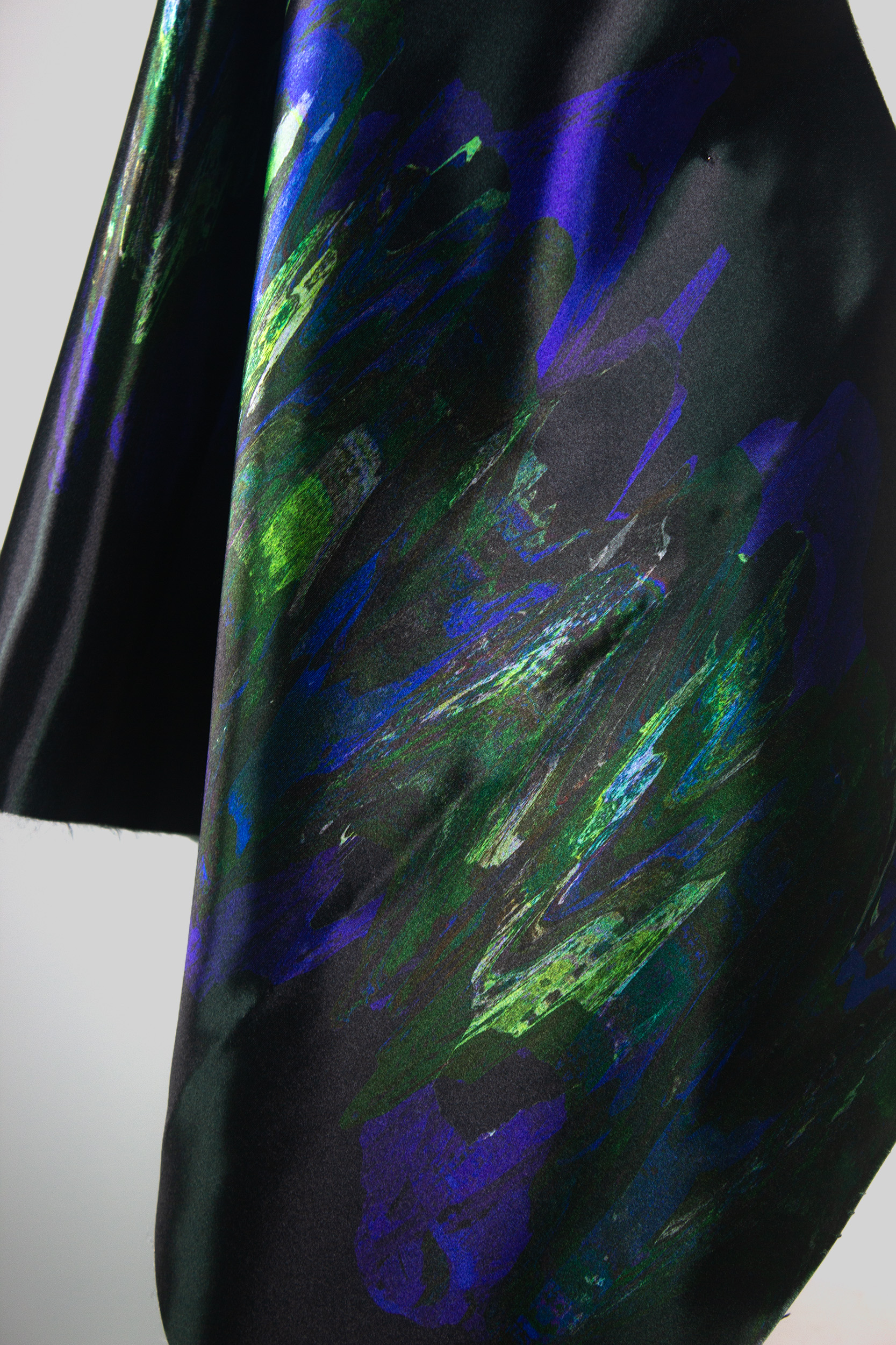 BA Textile Design work by Seren Faber showing a textured print on a highly reflective fabric.