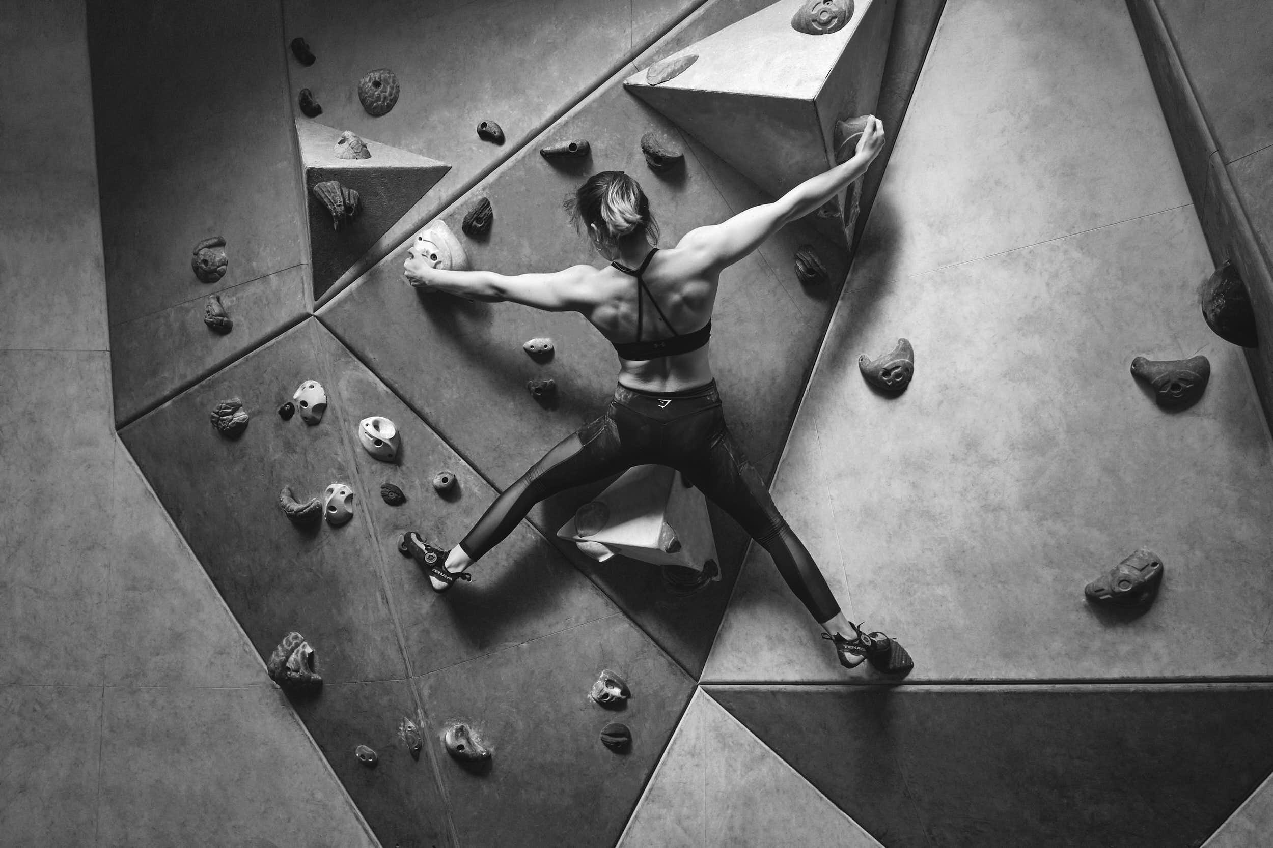 BA Photography work by Tadas Kirtiklis showing an action image of a rock-climber on an indoor climbing wall