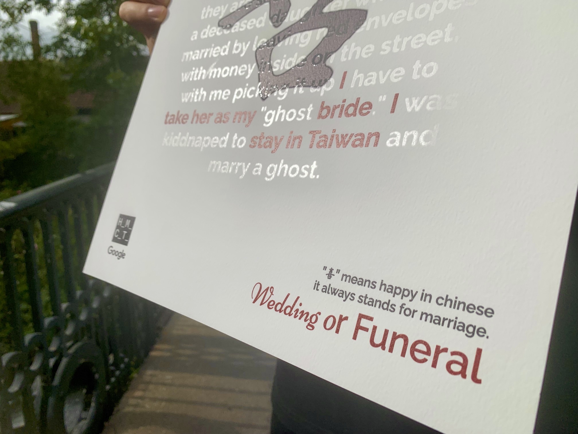 Photograph of a poster showing a wedding turn to a funeral, with light-changing inks