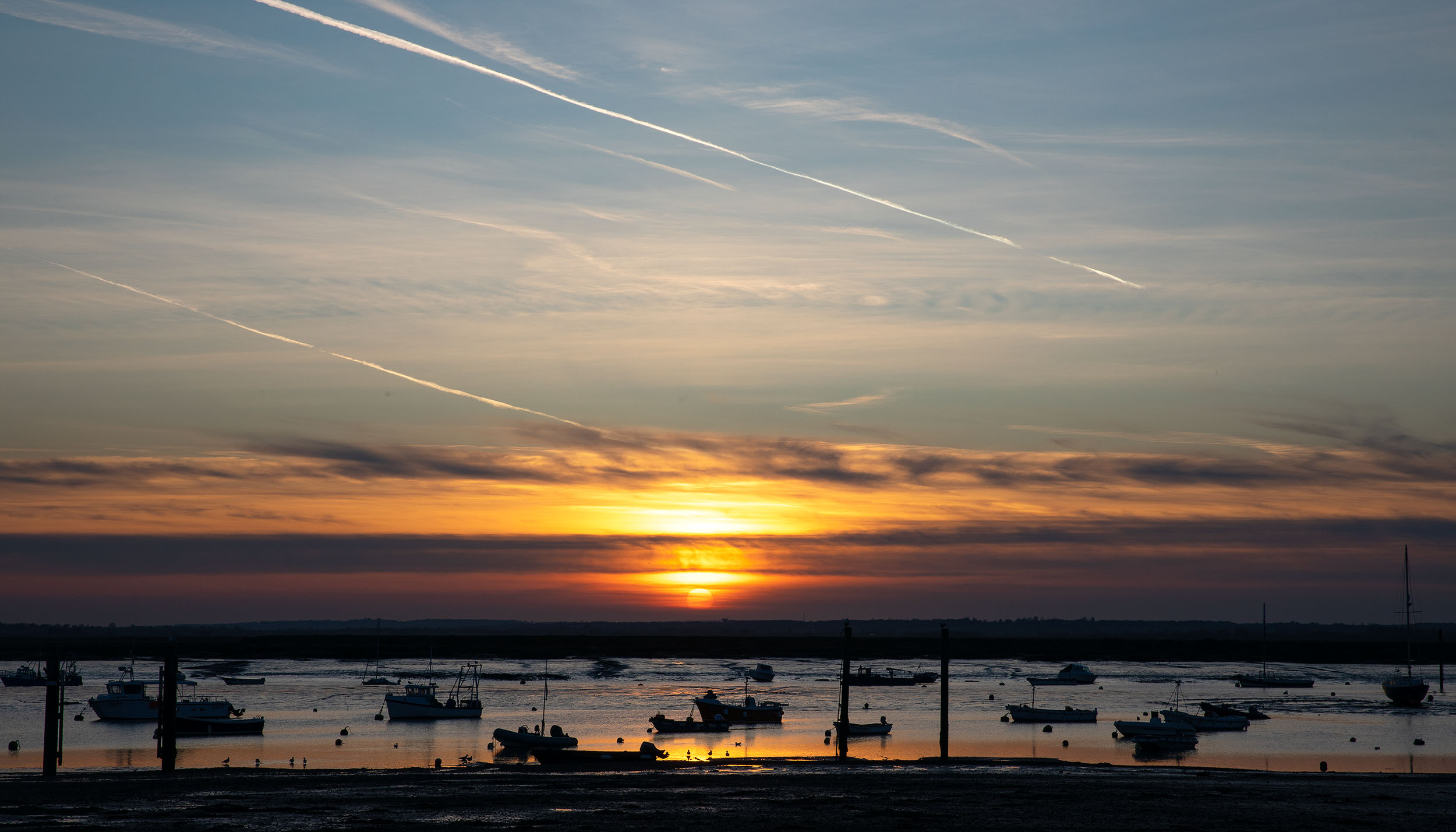 Photography by Amelia Sadd of the sunset at Mersea Island.