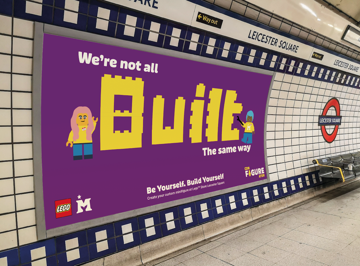 A poster in a tube station for the Lego x Mermaids UK 'Con-Figure-Ator', featuring bright colours and lego-based visuals