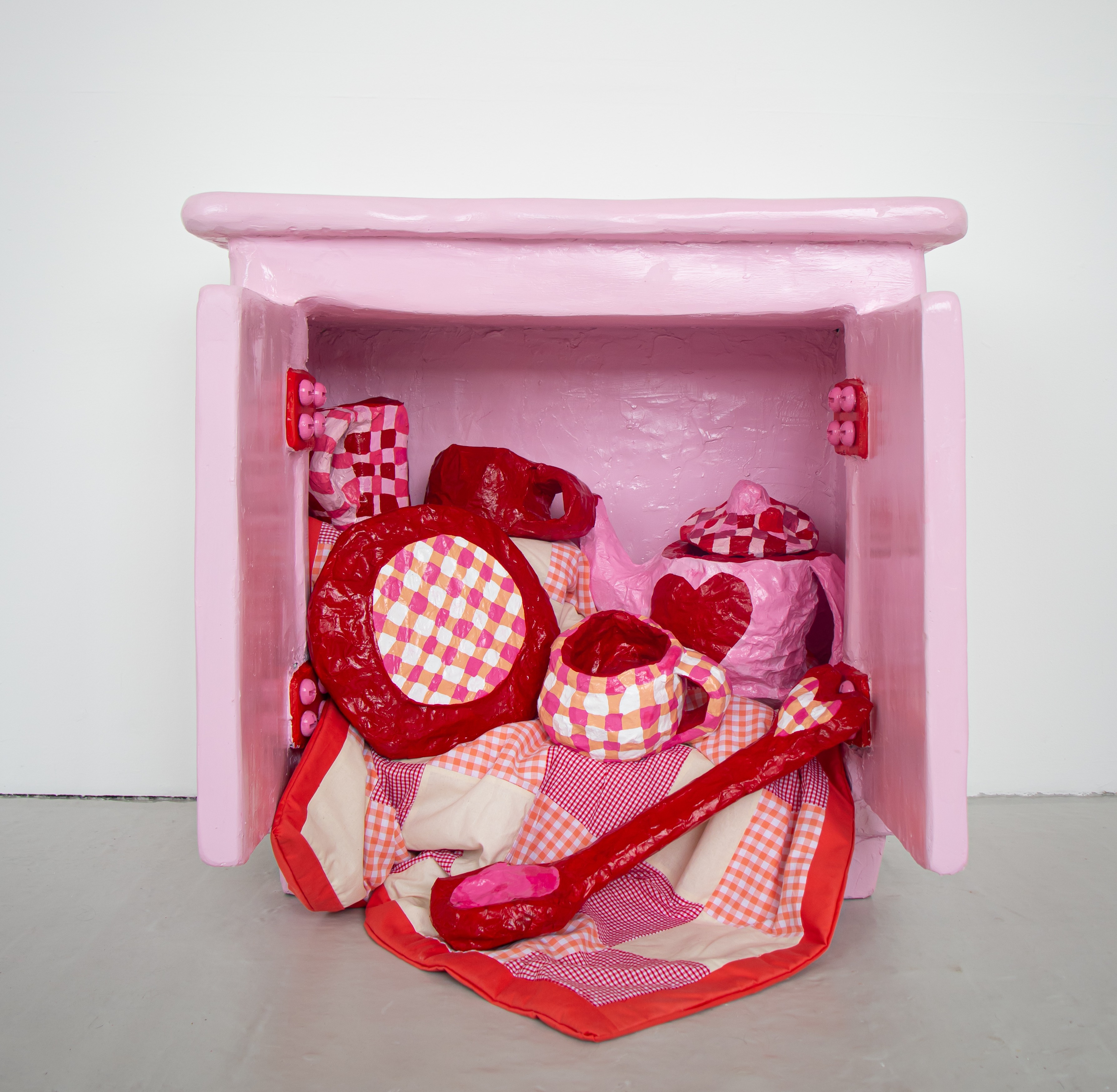 Fine Art work by Georgia Keeling showing sculptures of a picnic set within a cabinet
