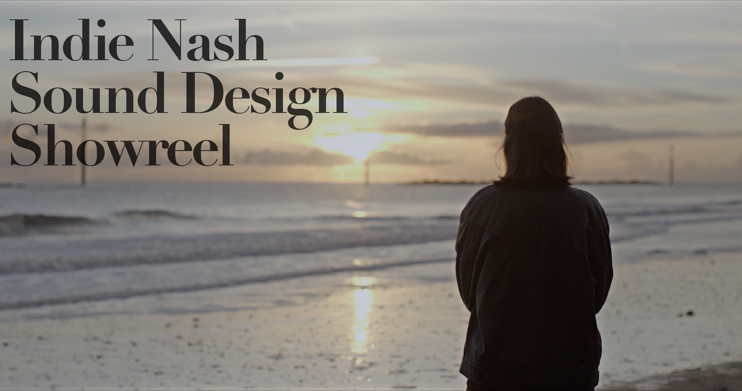 Still from film featuring silhouetted figure on a beach with the words Indie Nash Sound Design Showreel
