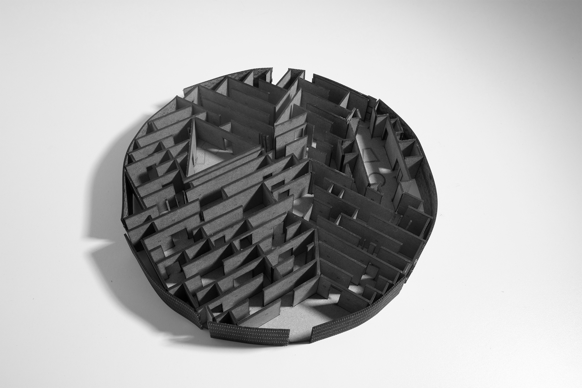 Physical 3D model of a maze made from MDF