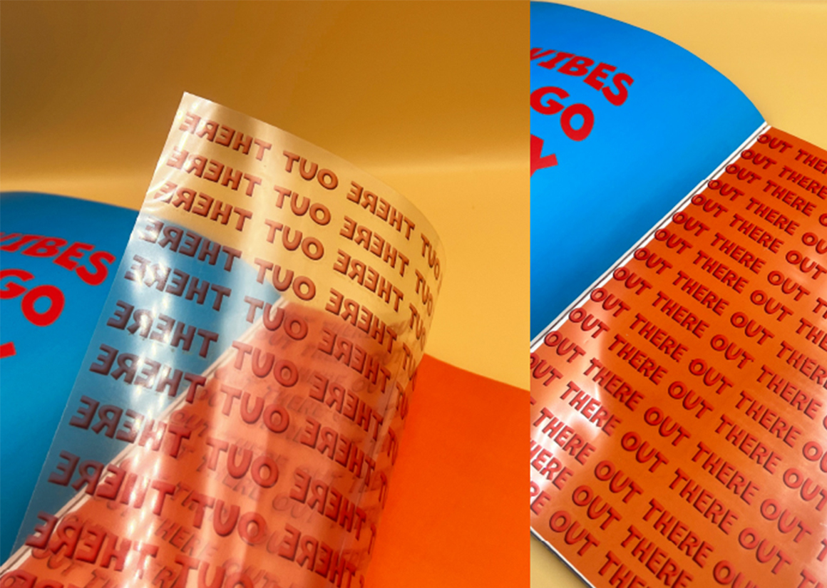 Acetate Pages in the magazine that say 'out there' repeated in red.