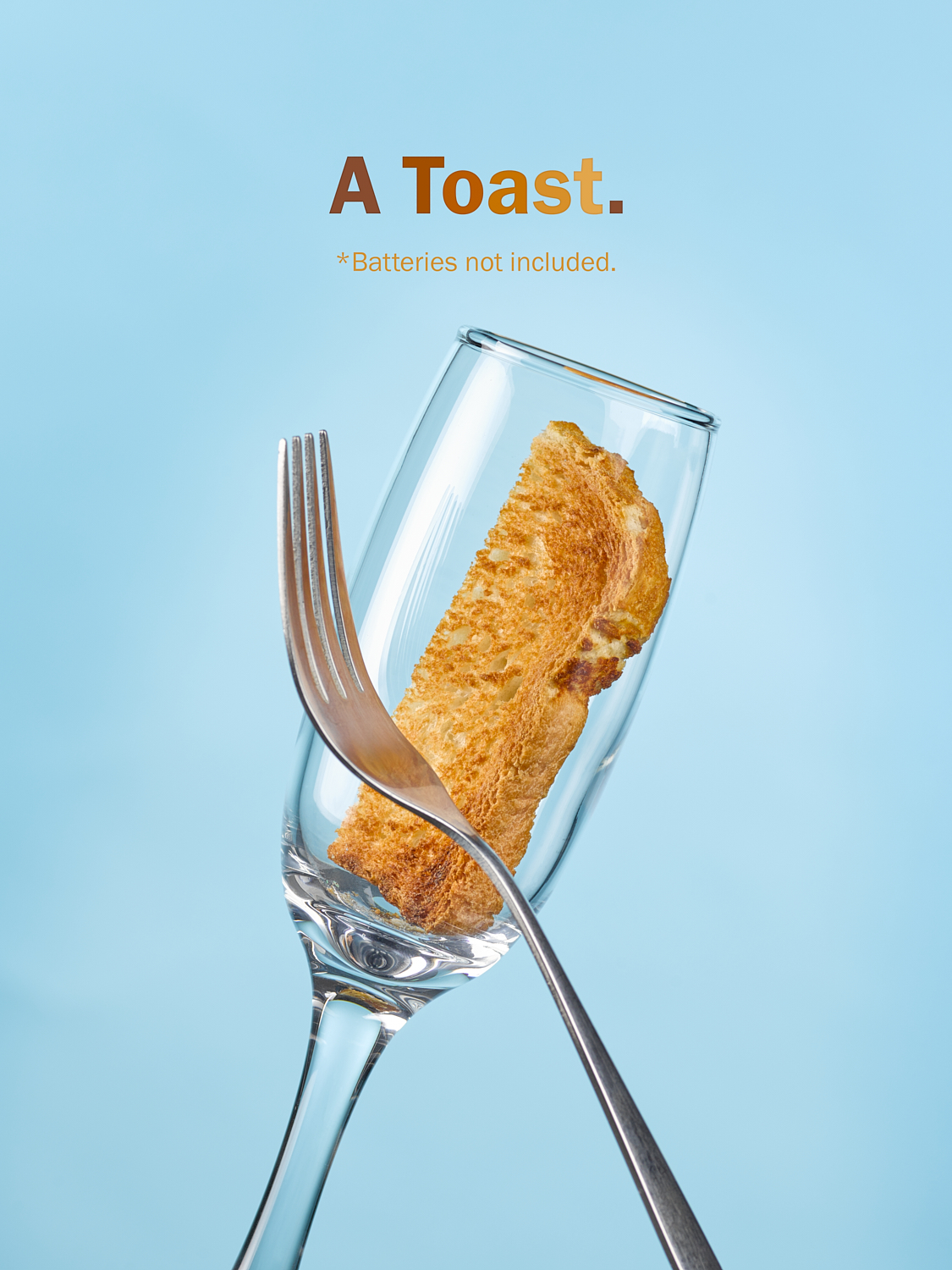 A photograph by Joey Rolph, depicting a champaign flute glass with toast in it.