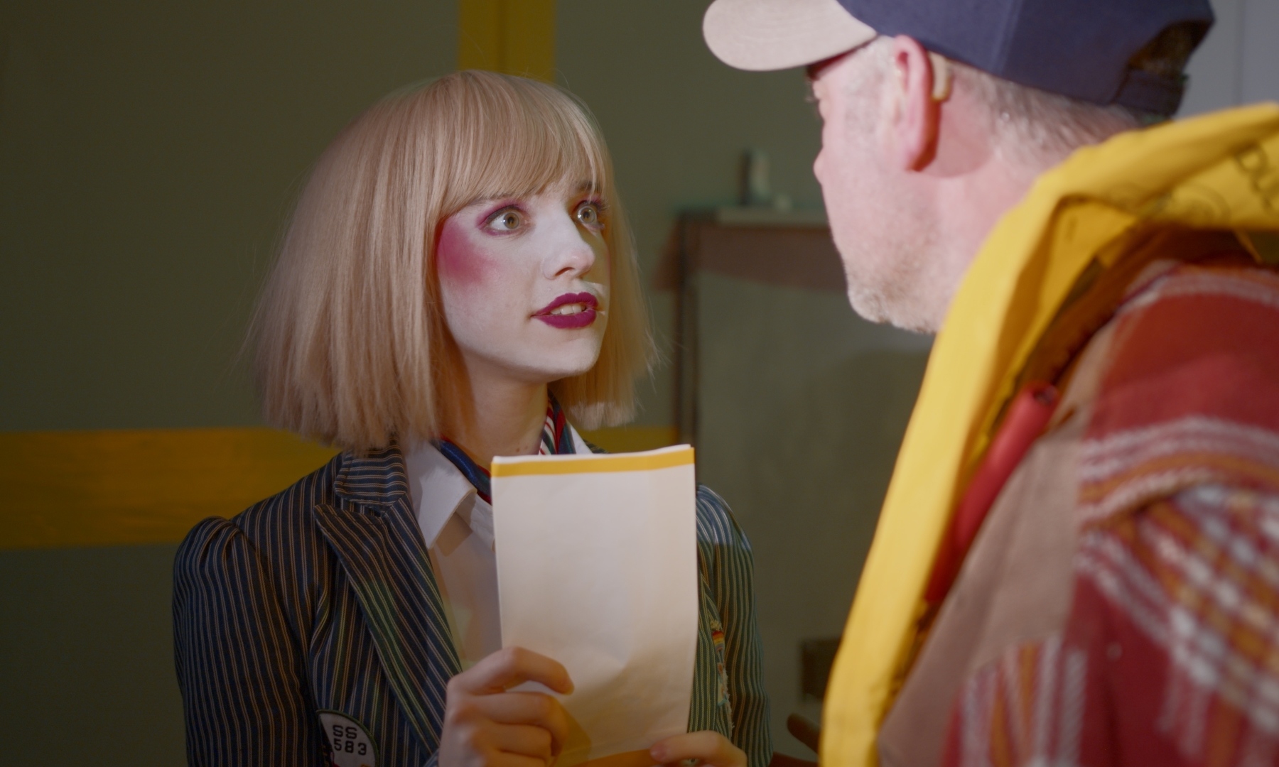 Still from Mothball, my thesis film featuring two characters in conversation. Role: Director of Photography
