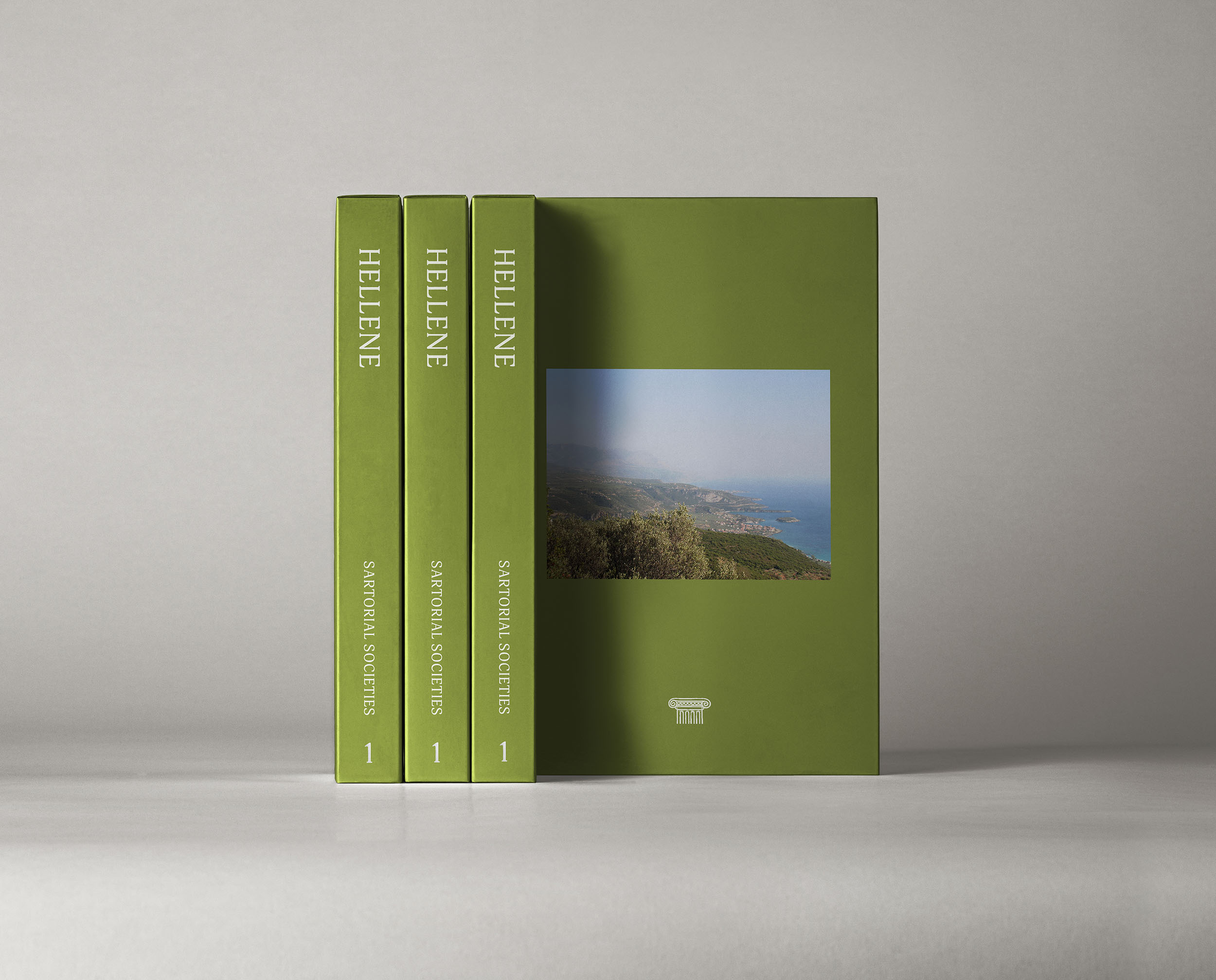 Slipcase mock-up by Katie Thompson showing an olive green design with travel image and spine text.