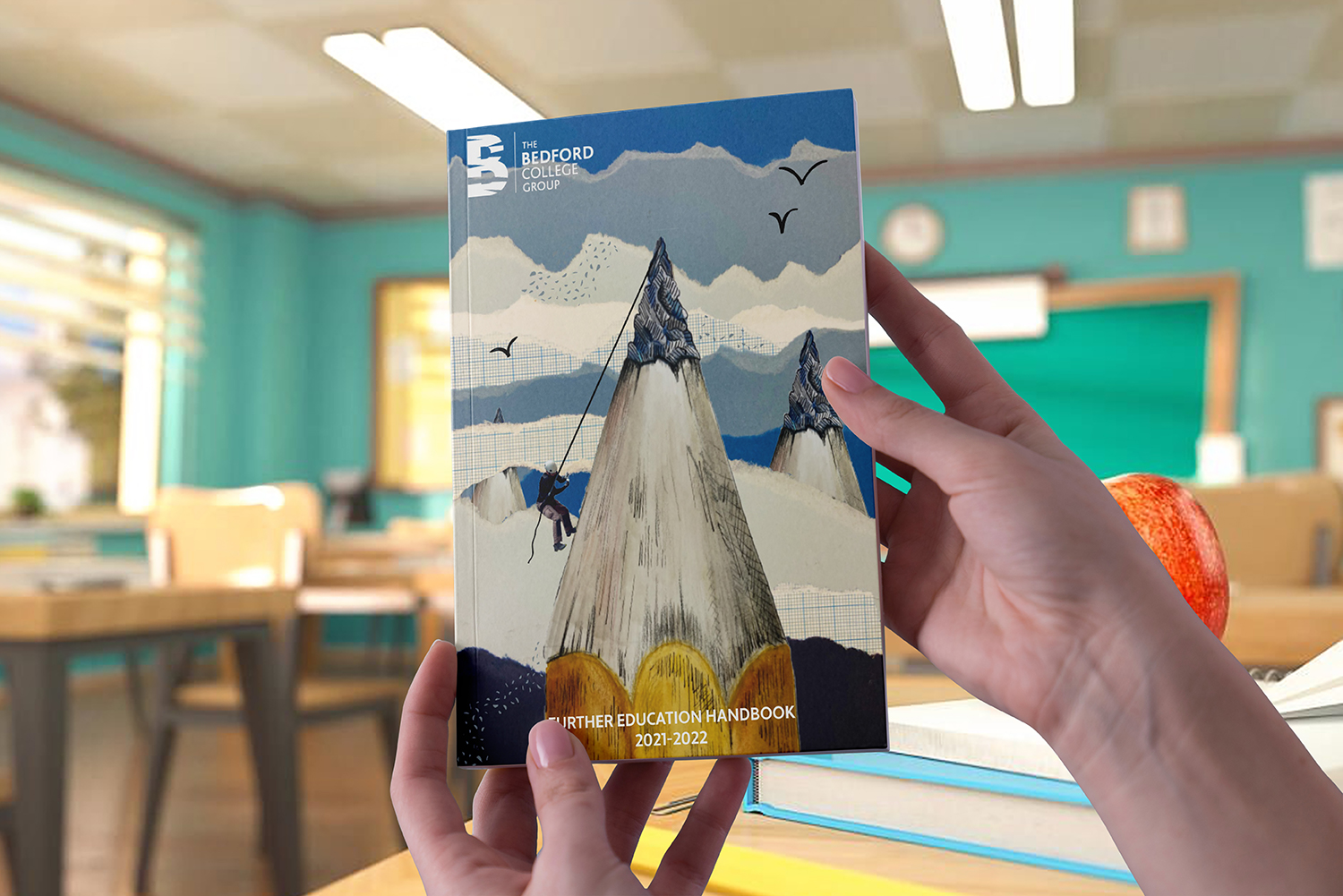 Front cover of student handbook displaying pencil/mountain illustration in a classroom situation.
