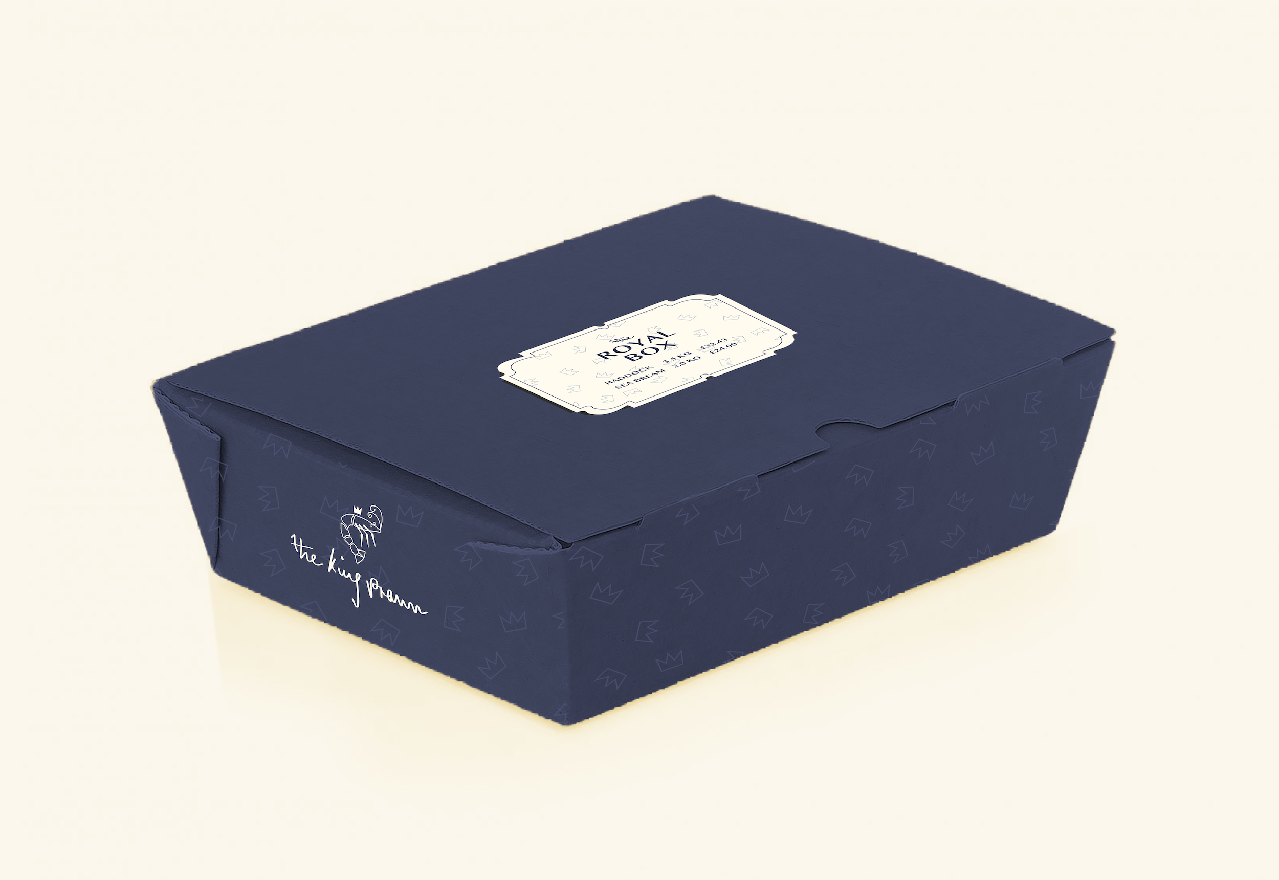 A deep blue takeaway box decorated with crowns, with a label that says 'The Royal Box'.